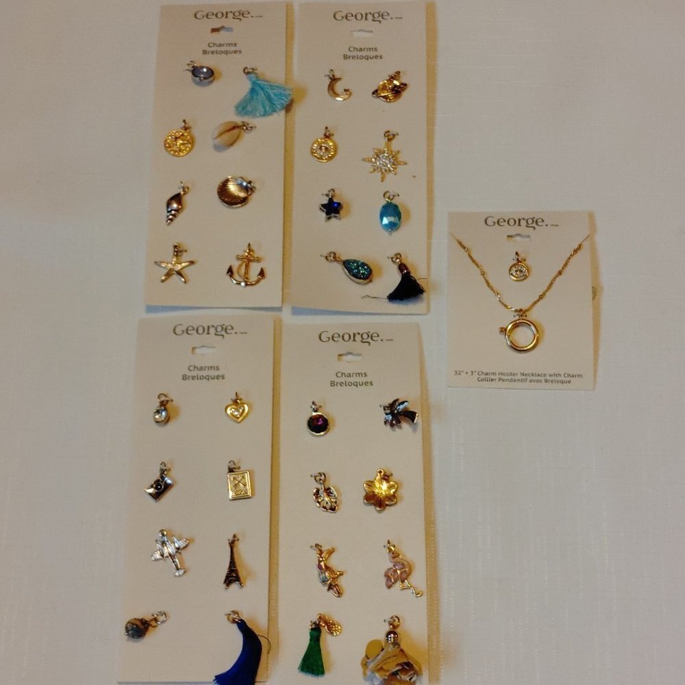 CHARM NECKLACE LOT BNWT Charm necklace with 33 Charms Gold tone